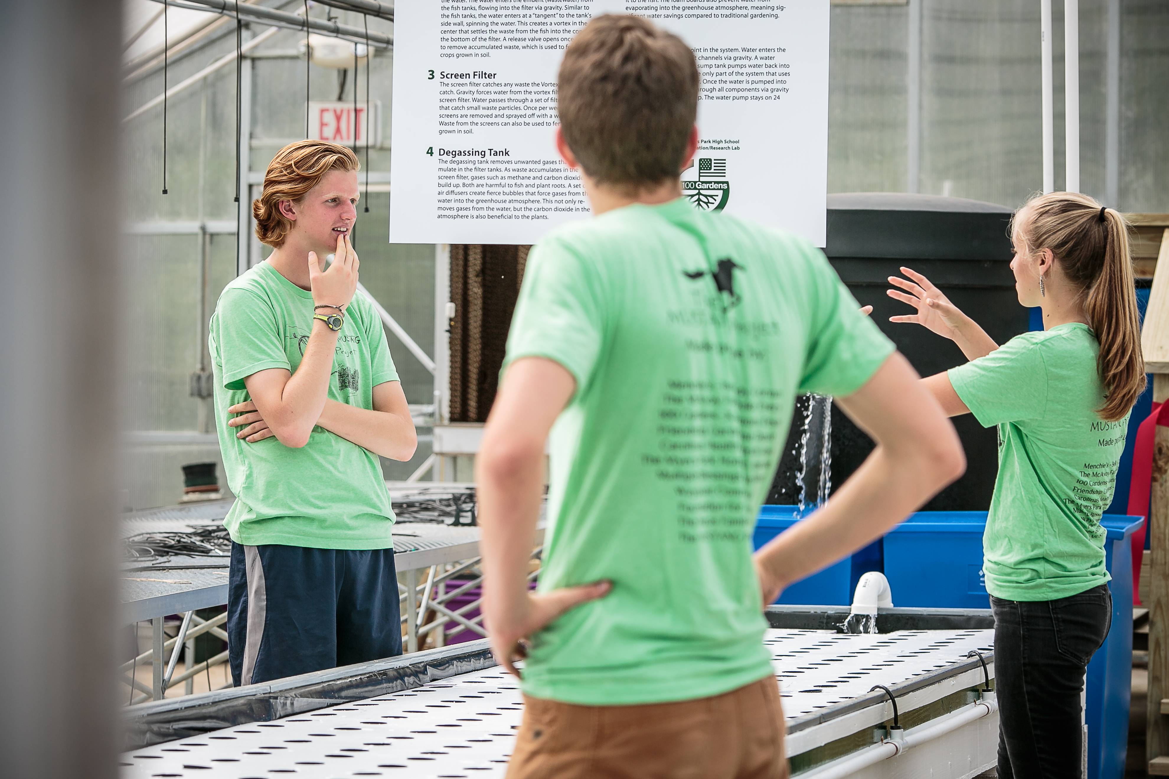 Mustang Project students explaining the workings of the aquaponics system